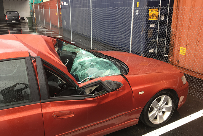 SunLive - Car crushed by toppled container - The Bay's News First