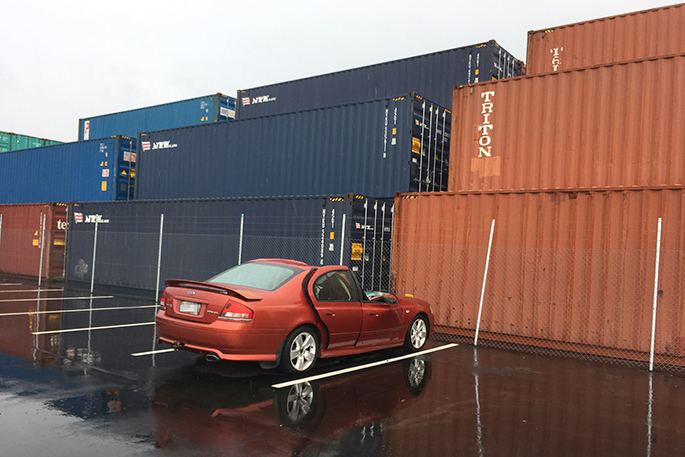SunLive - Car crushed by toppled container - The Bay's News First